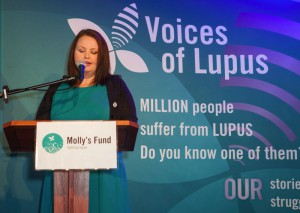 Molly at podium LAM 2013 Kickoff